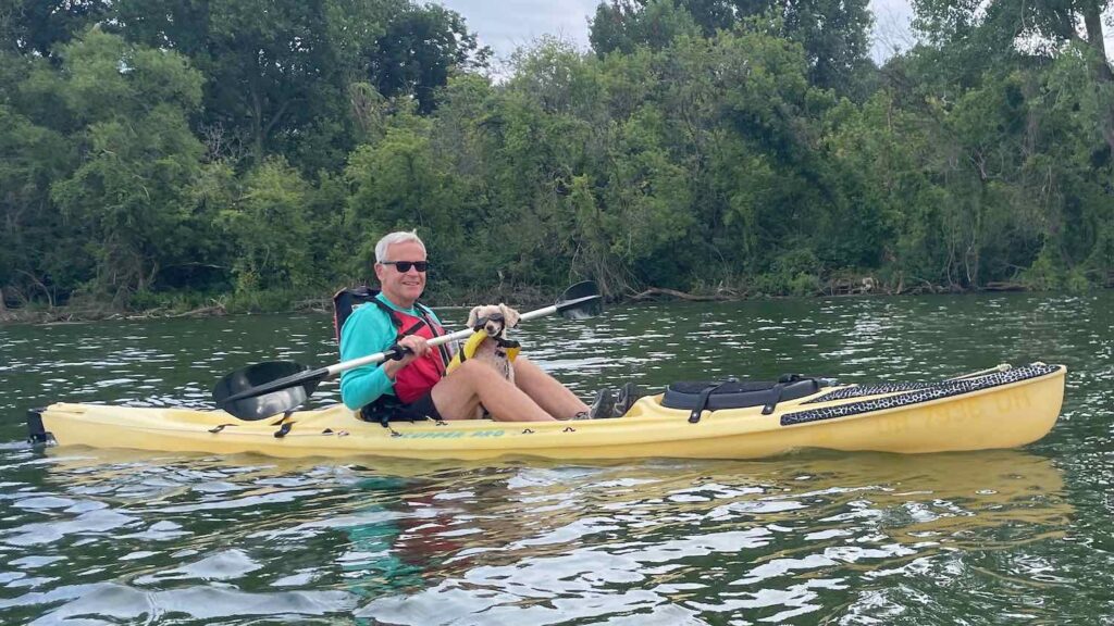 A Cleveland Fagowees member out kayaking with his dog