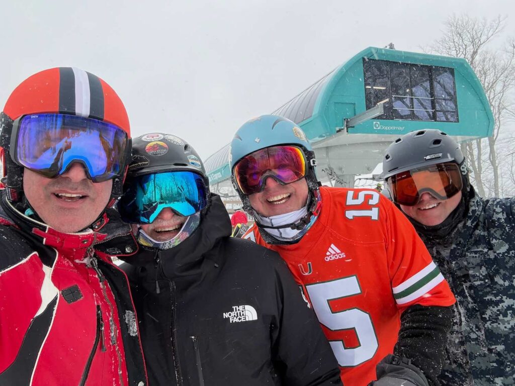 Fagowees Ski Club members laughing at top of the mountain