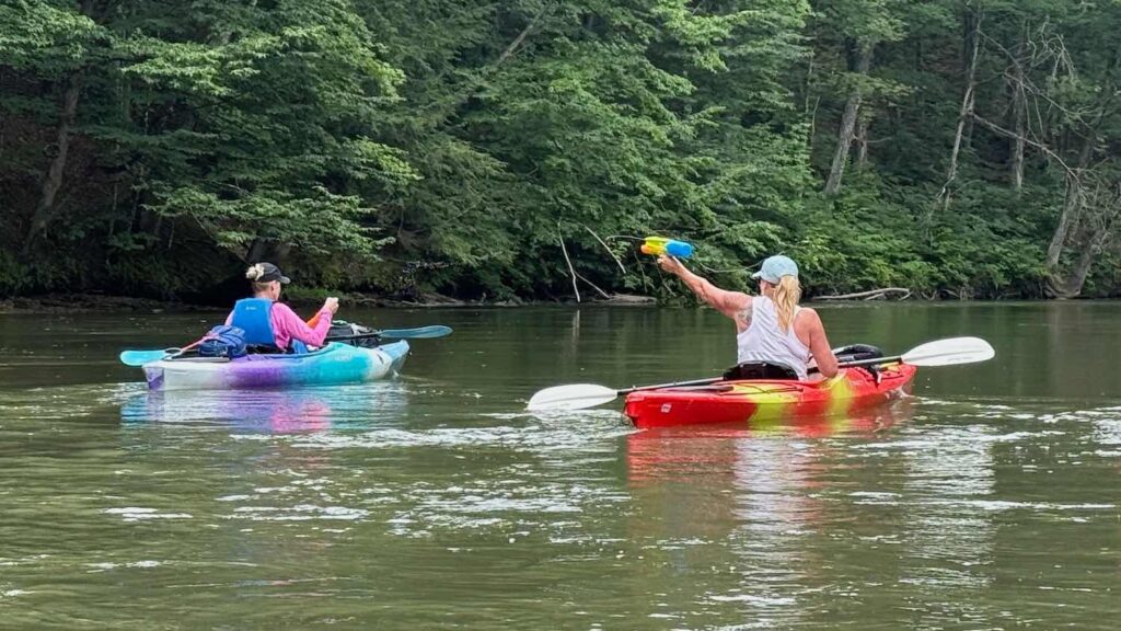 Squirt gun fight between 2 kayaking Cleveland Fagowees members