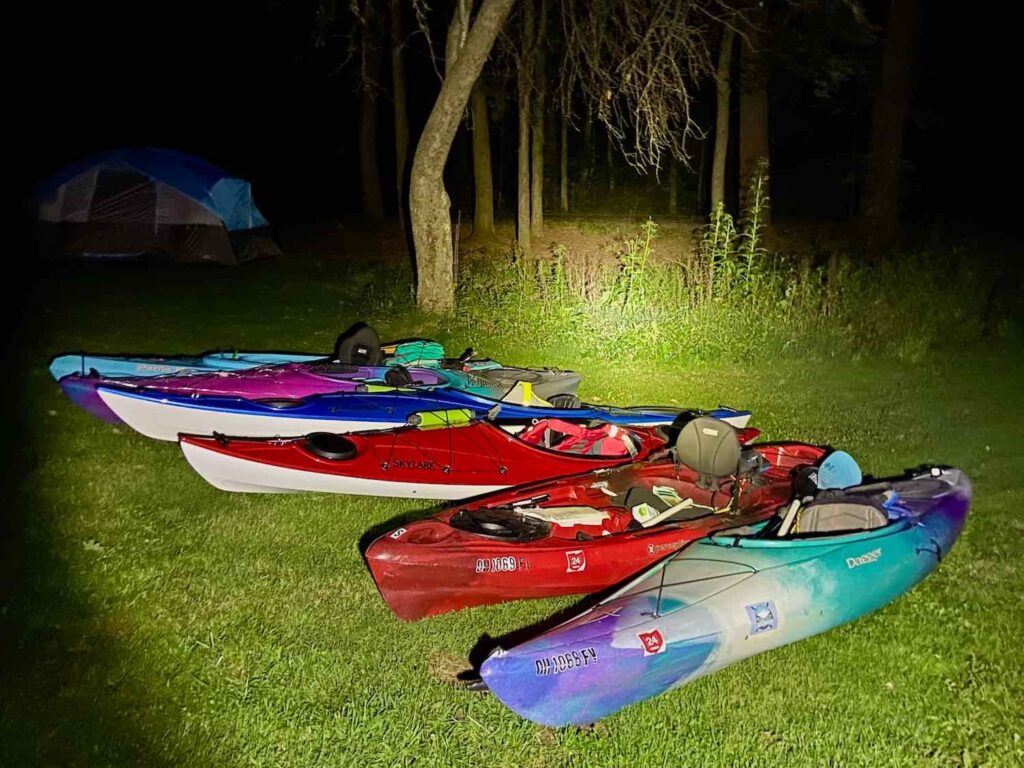 Cleveland Fagowees member kayaks are stowed during a night at Nimisila